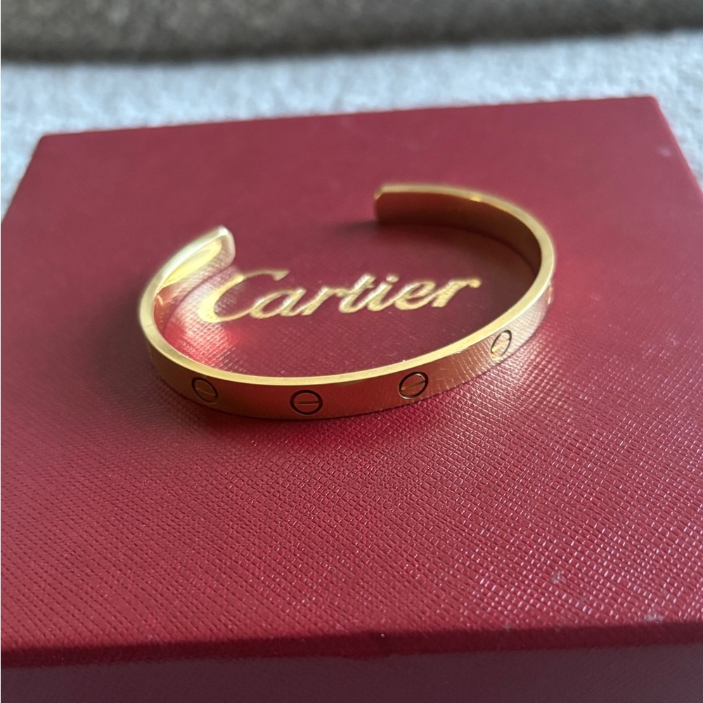 Cartier love open bracelet size 18 yellow gold